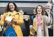  ?? TOLGA AKMEN/AFP-GETTY ?? Liberal Democrats party activists hold “Stop Brexit” leaflets Wednesday in London as they canvas for their party’s candidates in the forthcomin­g European elections.