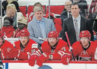  ?? ASSOCIATED PRESS FILE PHOTO ?? Carolina Hurricanes head coach Bill Peters, left, and assistant coach Rod Brind’ Amour watch the play in a 2016 game in Raleigh, N.C. Brind’Amour was recently promoted to head coach of the Hurricanes.