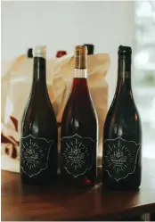  ??  ?? The Lucali Original Smash Bag features three bottles of in-house vino made in collaborat­ion with L.A.S Vino from Margaret River, together with a curated playlist with instructio­ns on when to play each track based on the bottle you drink