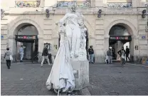  ?? PHOTO: GETTY IMAGES ?? The Statue de la Paixin Nouailles neighbourh­ood covered with a handmade mask and plastic in Marseille, France.