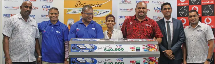  ??  ?? Post Fiji executives with representa­tives from Vodafone Fiji and Janty Kanvan Pte Ltd in Suva on February 21, 2020.