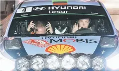  ??  ?? New Zealand driver Hayden Paddon (R) and co-driver John Kennard sit in their car at the start of the 85th Rallye of Monte-Carlo. — AFP photo