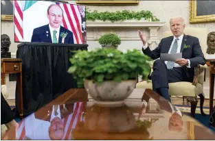  ?? ANDREW HARNIK — THE ASSOCIATED PRESS ?? President Joe Biden has his virtual meeting with Ireland’s Prime Minister Micheal Martin on Wednesday in the Oval Office of the White House. Biden told Martin he supports the Good Friday Agreement.