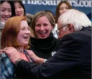  ?? (AP/Andrew Harnik) ?? Democratic presidenti­al candidate Bernie Sanders of Vermont greets a member of the audience Sunday after speaking at a campaign stop in Claremont, N.H.