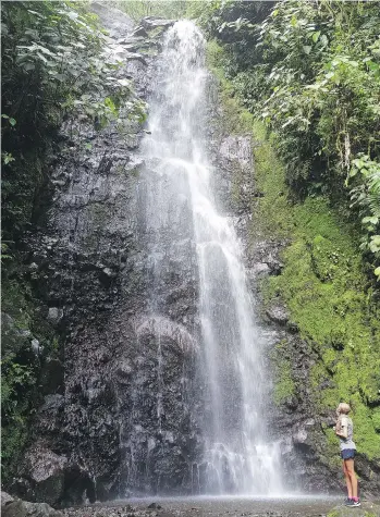  ?? PHOTOS: MIKE GRENBY ?? One of many waterfalls enchant a passerby near Arenal Volcano in central Costa Rica.