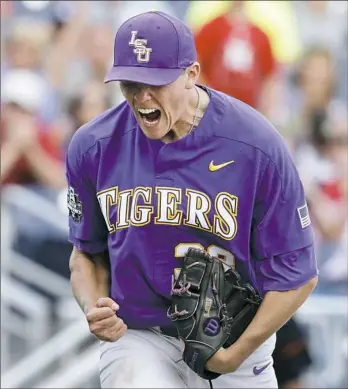 ??  ?? LSU closer Zack Hess struck out four of the final five batters in the Tigers’ win.