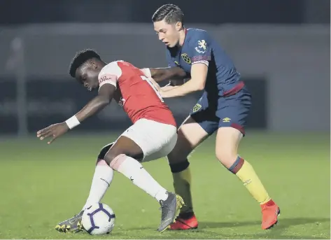  ??  ?? Conor Coventry (right) challenges Bakary Sako of Arsenal during a Premier 2 League match in 2019. Photo: Getty Images.