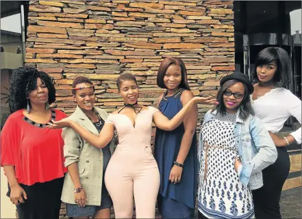  ?? Picture: QAQAMBA MAGADLA ?? FASHION GURUS: Founder of SA Fashion Festival Nolitha Mqunyana standing with WSU second-year fashion design students