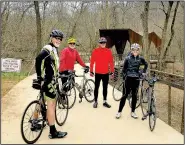  ?? (Courtesy Photo) ?? Members of the Bella Vista Bicycle Club stop for a photo on a cool weather ride last winter.