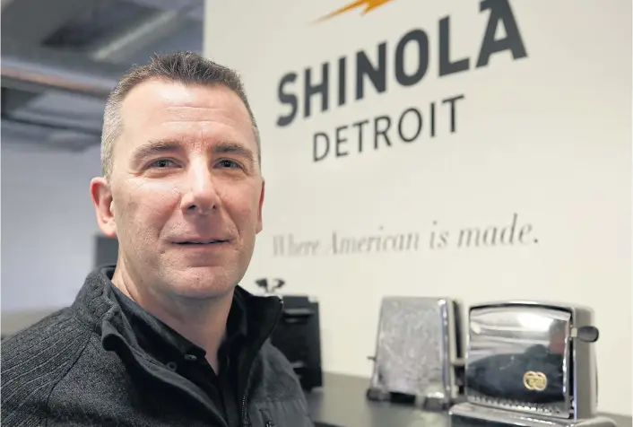  ??  ?? MAIN PHOTO Shinola CEO Tom Lewand poses at the watch factory in Detroit, Michigan.