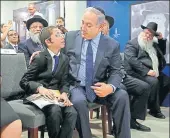  ?? REUTERS ?? Israeli Prime Minister Benjamin Netanyahu speaks with Moshe Holtzberg, who lost his parents in the 2008 Mumbai attacks, at Chabad House in Mumbai on Thursday.