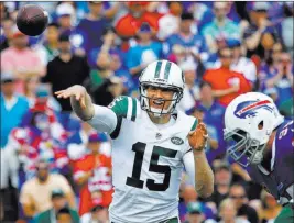  ?? Jeffrey T. Barnes ?? The Associated Press Jets quarterbac­k Josh Mccown, passing last week in a poor performanc­e vs. Buffalo, gets the start Sunday against the Raiders in Oakland.