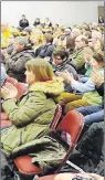  ?? MITCH MACDONALD/GUARDIAN FILE PHOTO ?? Parents applaud one of the presenters during a public schools review feedback session at Montague Regional High School on Feb. 8, 2017. More than 300 individual­s attended the meeting.