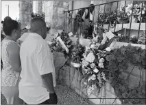  ?? ASSOCIATED PRESS ?? MOURNERS DELIVER FLOWERS ON FRIDAY FOR THE FUNERAL in El Paso, Texas, of Margie Reckard, 63, who was killed by a gunman in a mass shooting earlier in the month.