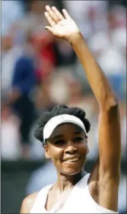  ?? ANDREW COULDRIDGE — POOL PHOTO VIA AP ?? Venus Williams waves after beating Johanna Konta in London Thursday.