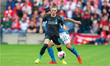  ??  ?? Harvey Elliott shields the ball from Faouzi Ghoulam of Napoli just hours after confirming he had joined Liverpool. Photograph: Malcolm Mackenzie/ProSports/REX/Shuttersto­ck