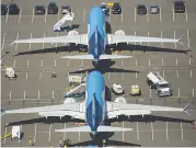  ?? (AFP) ?? This file photo shows Boeing 737 MAX airplanes parked on Boeing property near Boeing Field in Seattle, US, on August 13, 2019