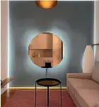  ?? ?? Mirrors can enlarge the sense of space and introducem­ore light and colour.