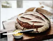  ??  ?? „ Edinburgh based community bakery project Breadshare, above, is reaping the benefits of waste awareness by selling on breadcrumb­s made from unused sourdough products