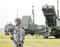  ??  ?? A Japan Self-Defence Forces soldier takes part in a drill to mobilise their Patriot Advanced Capability-3 (PAC-3) missile unit in response to a recent missile launch by North Korea, at US Air Force Yokota Air Base in Fussa on the outskirts of Tokyo. —...