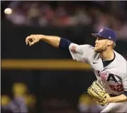  ?? CHRISTIAN PETERSEN — GETTY IMAGES ?? Relief pitcher Daniel Bard of Team USA pitches against Team Colombia during the World Baseball Classic Pool C game at Chase Field on March 15, 2023 in Phoenix, Arizona.