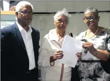  ??  ?? Margaret Pillay of Everham Heights, Phoenix is flanked by MEC Pillay and Mayor Gumede at the communityc­elebration in Waterloo.