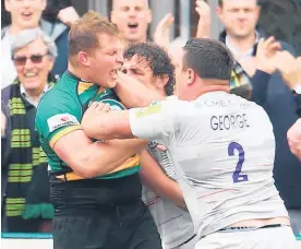  ?? Picture / Getty Images ?? Northampto­n hooker Dylan Hartley (left) tussles with Saracen Jamie George during their semifinal match.