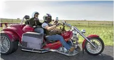  ?? Photo: Bev Lacey ?? FUN TIMES: Paul Goodin takes Robbie Raccanello and Tex the dog for a ride on Paul’s Touroz Trike. Robbie, diagnosed with a brain tumour at two and a half, celebrated his 40th birthday yesterday.