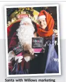  ?? Santa with Willows marketing manager Donna Schifillit­i. ??