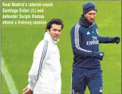  ??  ?? Real Madrid’s interim coach Santiago Solari (L) and defender Sergio Ramos attend a training session