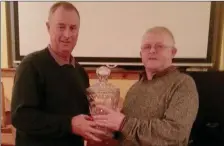  ??  ?? Organiser Pat Melia presenting the 2017 Macroom Person of the Year award to Willie O’Rirodan.