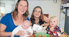  ??  ?? Back for seconds: Plimmerton mum Julia Barton has become Bellyful Porirua’s first repeat customer, getting free meals delivered by Rebecca Morahan after the birth of her children Oliver, 6 weeks, and Amber, 19 months.