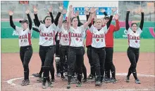  ??  ?? Canada’s women’s softball team salutes the crowd after its preliminar­y win over Mexico Thursday.