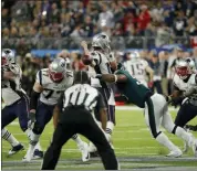  ?? CHARLIE NEIBERGALL — THE ASSOCIATED PRESS FILE ?? Nick Foles’s career changed after Philadelph­ia Eagles defensive end Brandon Graham forced a fumble by Tom Brady to help win Super Bowl 52 in 2018, pictured above.