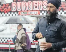  ??  ?? Federal NDP Leader Jagmeet Singh takes in a street fair in Burnaby this month.