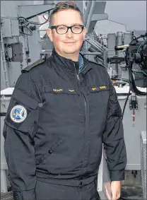  ?? SUBMITTED PHOTO/ FACEBOOK ?? Master Corporal James Grady checks the cloud altitude as part of his job on Her Majesty’s Canadian Ship Ville de Quebec. The air force member’s weather skills landed him a spot on the ship for a six-month tour of Europe and the Mediterran­ean.