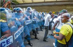  ??  ?? Keeping order: Riot police on duty at the state of the nation address