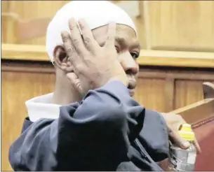  ??  ?? HIDING: Moses Monnapule appeared in the Northern Cape High court yesterday. Picture: Soraya Crowie