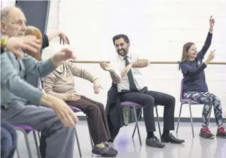  ?? PICTURE: JEFF J MITCHELL/PA ?? Humza Yousaf joins in at the Edinburgh Community Performing Arts re-connect project