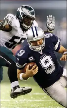  ?? THE ASSOCIATED PRESS FILE ?? The Eagles’ Brandon Graham sacks then-Dallas Cowboys quarterbac­k Tony Romo (9) during the 2014 season. Graham, now entering his eighth season, has become a steady defensive force, but still hasn’t proven worthy of a long-term, big-money contract...