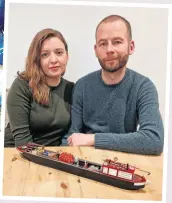  ?? PHOTO SUPPLIED BY AMANDA COOPER ?? Precious memories: Amanda and Stuart with the miniature model of Auriga which Amanda commission­ed for Stuart in memory of his father.