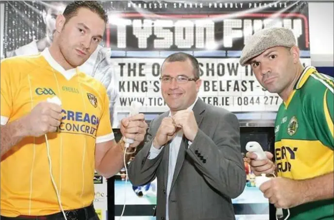  ??  ?? Tyson Fury has always been proud of his Irish heritage and he is pictured wearing an Antrim jersey in the build-up to one of his fights in Belfast.