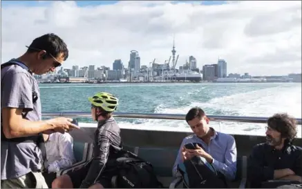  ?? DAVID MAURICE SMITH/THE NEW YORK TIMES ?? A view of downtown Auckland from aboard the Devonport ferry in New Zealand on March 21.