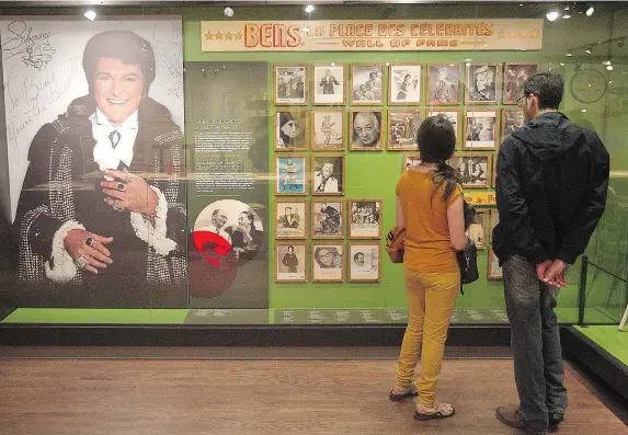  ?? PIERRE OBENDRAUF/ THE GAZETTE ?? The wall of fame at the Bens Deli memorabili­a exhibition features the likes of John Candy, Catherine Deneuve, Céline Dion, Liberace, Iron Maiden, Irving Layton and Michael Jackson.