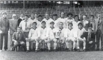  ??  ?? Champs Avon Villa won the 1982 Scottish Amateur Cup with a 1-0 win over Knockentib­er at Hampden. James Kennedy (back, fifth from right) recently passed away following a stroke