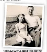  ??  ?? Holiday: Sylvia aged ten on the Isle of Man with her father, Bob