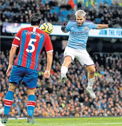  ??  ?? Sergio Aguero rises to head home and give City a 2-1 lead, with just three minutes remaining