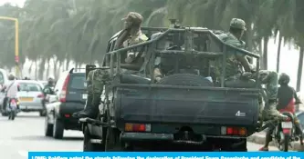  ?? — AFP ?? LOME: Soldiers patrol the streets following the declaratio­n of President Faure Gnassingbe and candidate of the ruling Union for the Republic (UNIR) party who was declared winner of the just concluded presidenti­al election yesterday.