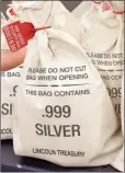  ?? ?? ■ SILVER HITS ROCK BOTTOM: It’s good news for state residents who get the Silver Vault Bags each loaded with 10 solid .999 pure State Silver Bars. That’s because residents are getting the reduced State Minimum set by the private Lincoln Treasury as long as they call before the