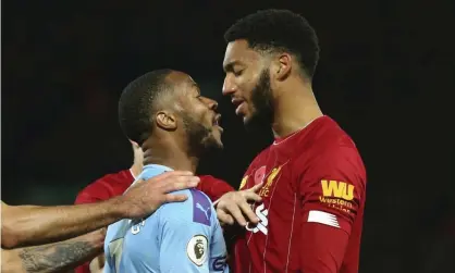 ??  ?? Raheem Sterling (left) and Joe Gomez of Liverpool squared up during Manchester City’s 3-1 defeat at Anfield. Photograph: Robbie Jay Barratt - AMA/Getty Images